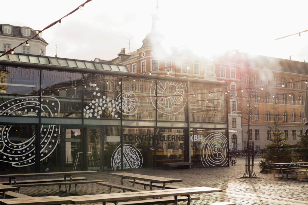 An outdoor view of Torvehallerne market in Copenhagen, Denmark