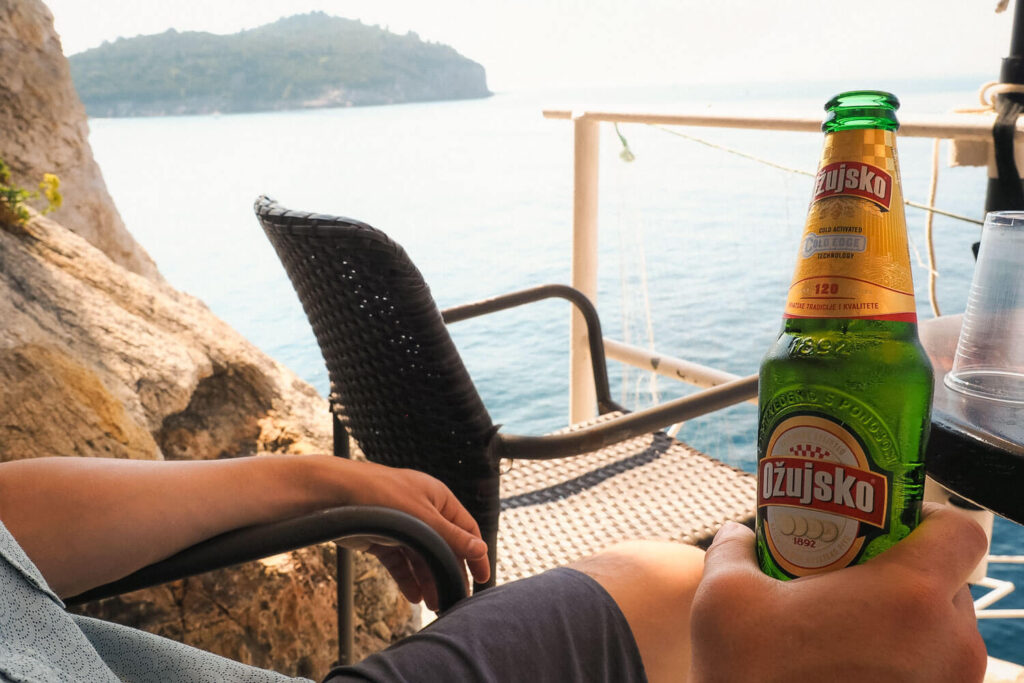 Enjoying a Croatian beer seaside at Buza Bar in Dubrovnik