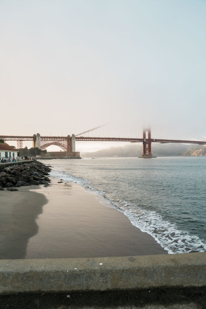 Foggy photo of the Golden Gate Bridge from Torpedo Wharf in San Francisco